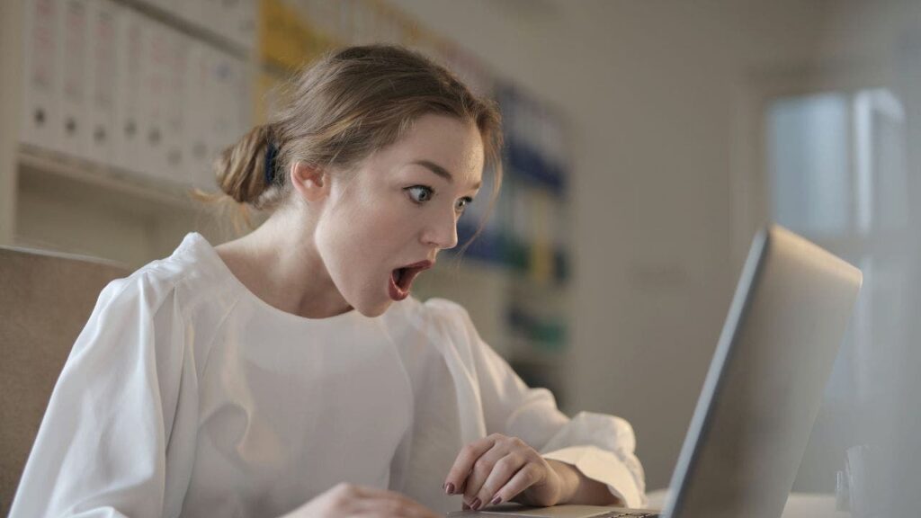 1 Woman Shocked At Computer.jpg