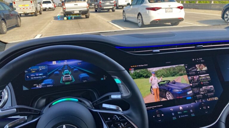 Mercedes drive pilot watching autoblog on youtube.jpg