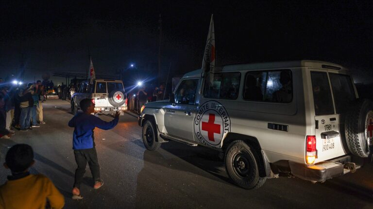 Israeli Hostages In Red Cross Ambulances.jpg