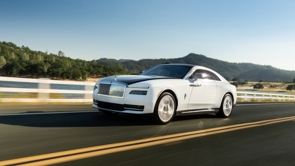 Rolls Royce Spectre In Arctic White Action Front Three Quarter.jpg