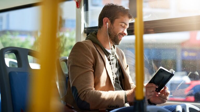 Man Reading On Bus 1.jpg