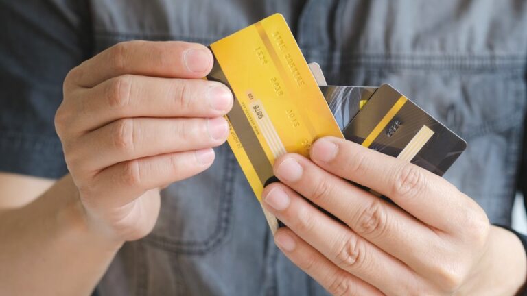 Man Holding Credit Cards 1.jpg