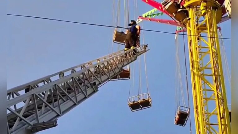 Emergency Personnel Rescue 13 People Stranded On Amusement Park Ride.jpg