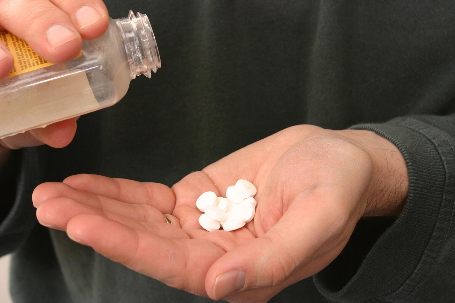 Pouring Aspirin Tablets.jpg