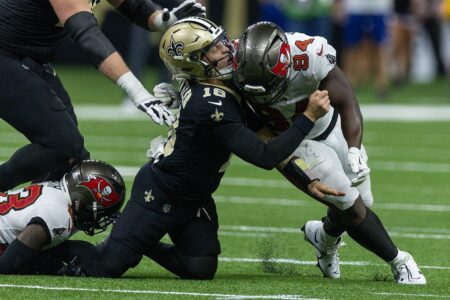 Kancey Calijah Spencer Rattler Bucs Saints Hit.jpg