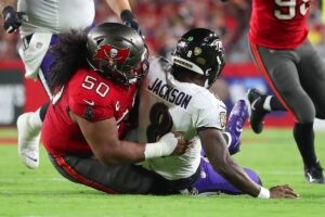 Vea Vita Lamar Jackson Bucs Ravens Sack Ground.jpg