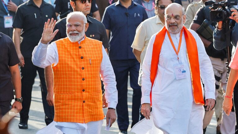 Indias Prime Minister Narendra Modi L Walks Alongside Amit Shah.jpg