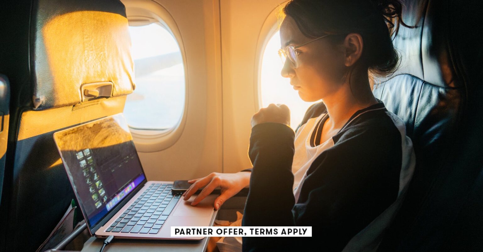 Social Image Partner Offer Terms Apply Woman Working With Laptop In The Airplane Oleh Slobodeniuk 24.jpg