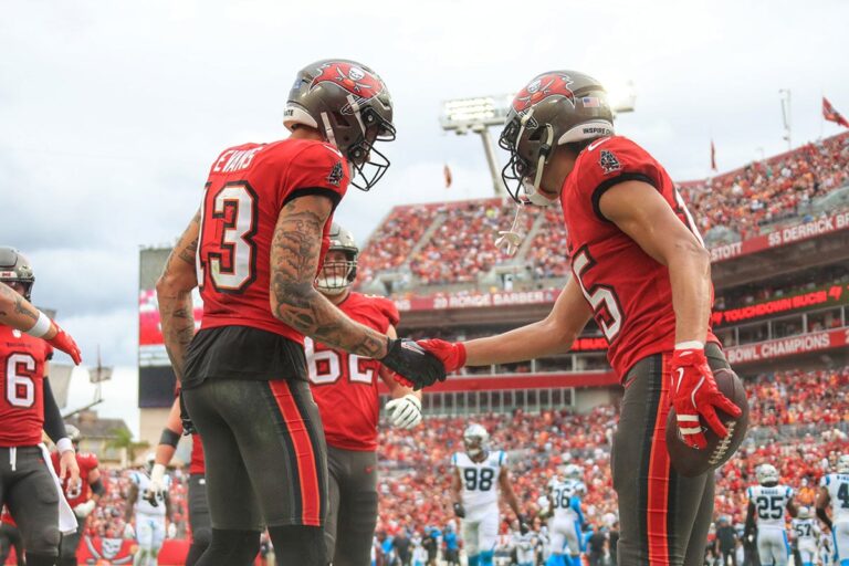 Evans Mike Jalen Mcmillan Bucs Panthers Handshake.jpg