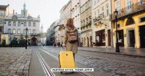Social image partner offer terms apply woman with a suitcase walking on european street nazar rybak 32.jpg