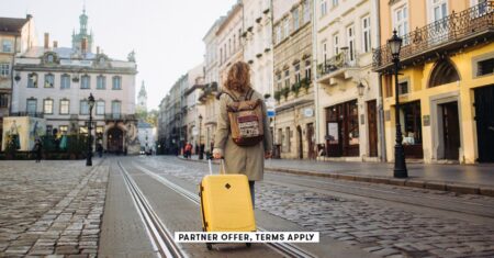 Social image partner offer terms apply woman with a suitcase walking on european street nazar rybak 32.jpg