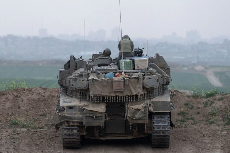 Idf tanks facing gaza scaled.jpg
